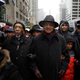 U.S. Representative Bobby Rush and Reverend Jesse Jackson link arms as they march with demonstrators protesting the shooting of Laquan McDonald along the Magnificent Mile November 27, 2015 in Chicago, Illinois.